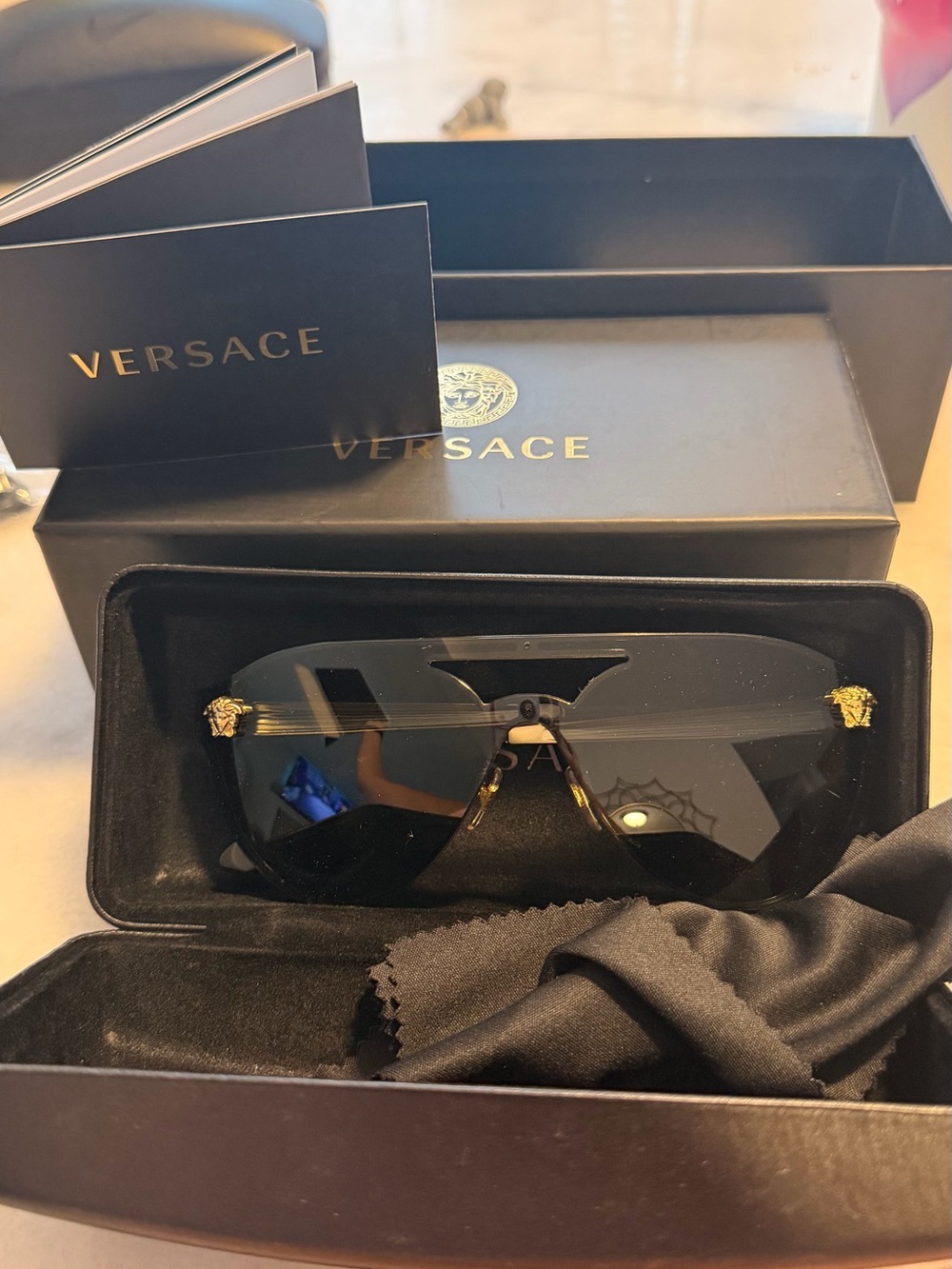 Versace Men’s Black Shield Sunglasses with Gold Medusa Details